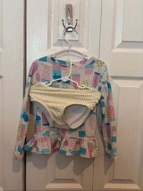 Ruffle Butts Girls Popsicle Print Rash Guard Set in Pastel Pink, Blue, Yellow